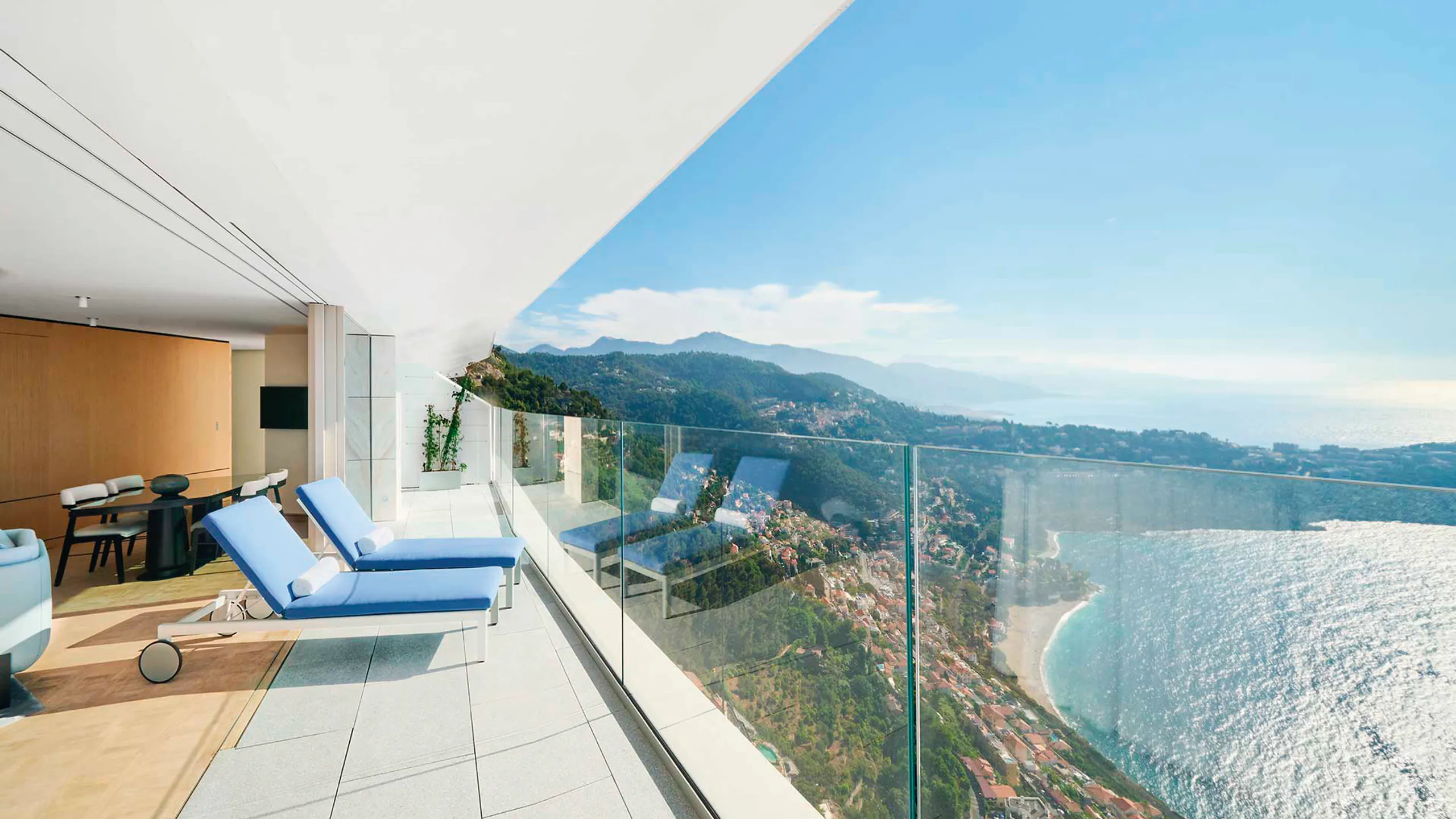 Coastal architecture extending toward the Mediterranean horizon
