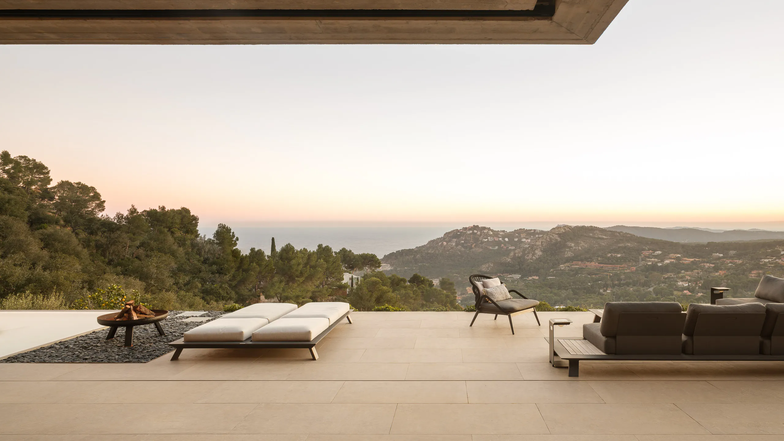 Open terrace oriented toward a warm southern sunset