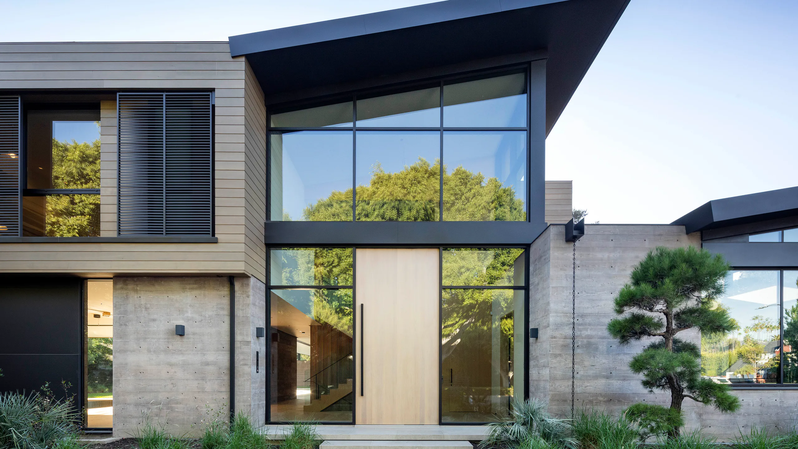 Precisely aligned architectural glazing and stone structure